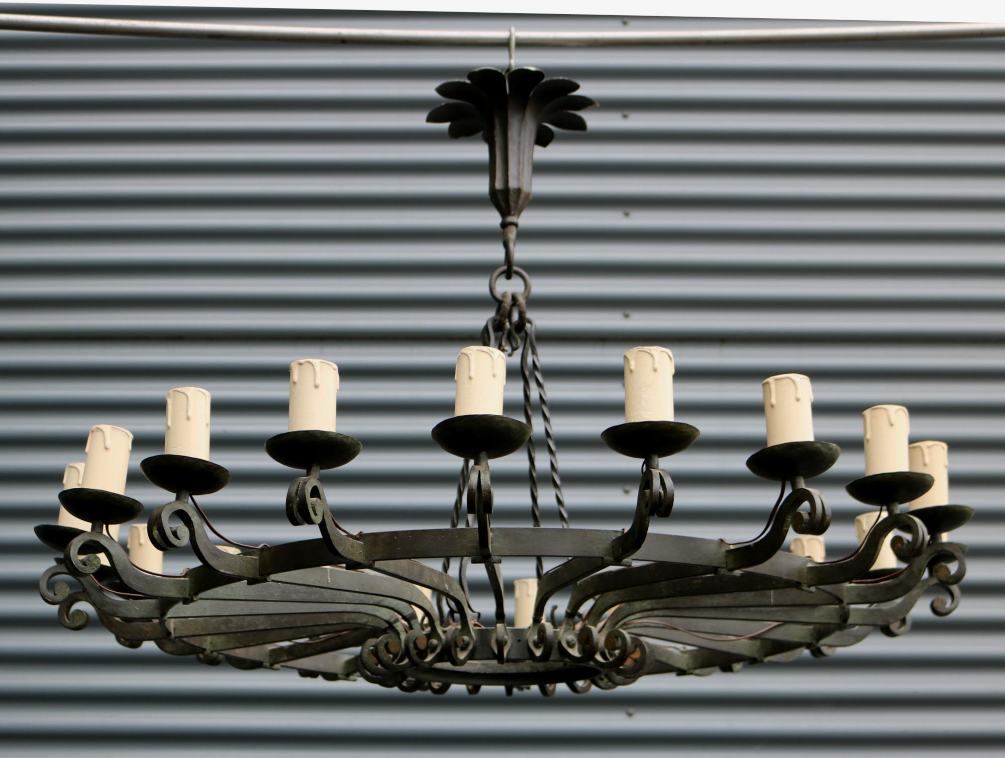 Large 20 light forged iron a-deco chandelier .