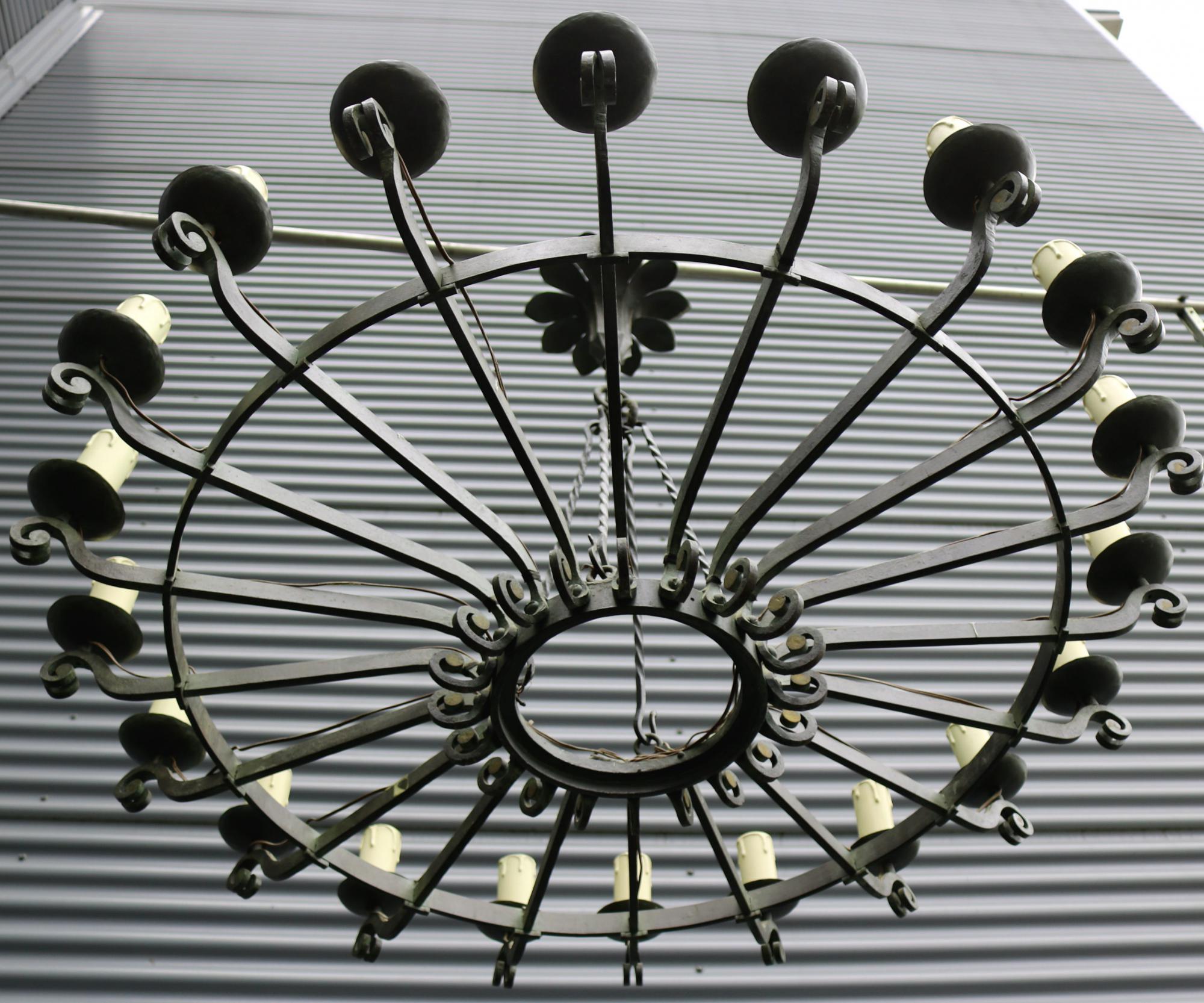 Large 20 light forged iron a-deco chandelier .